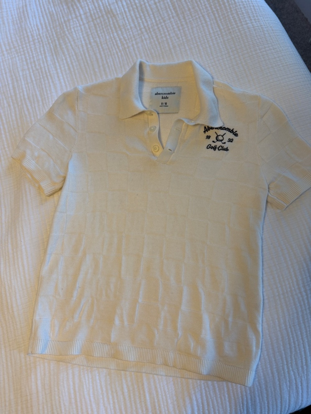 abercrombie kids cream polo with navy embroidered logo